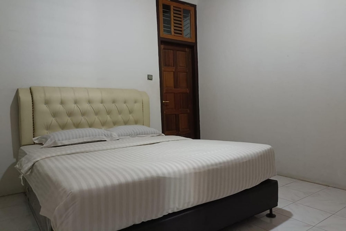 Imagen de la habitación del Hotel OYO 93706 Penginapan Syariah Hj. Kenan. Foto 4
