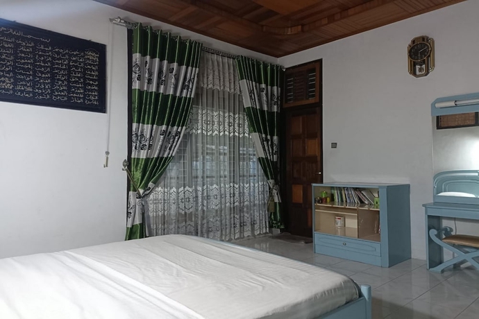 Imagen de la habitación del Hotel OYO 93706 Penginapan Syariah Hj. Kenan. Foto 13