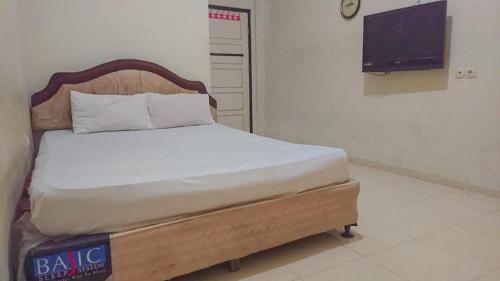 Imagen de la habitación del Hotel OYO 93714 Guest House Gembul Syariah. Foto 19