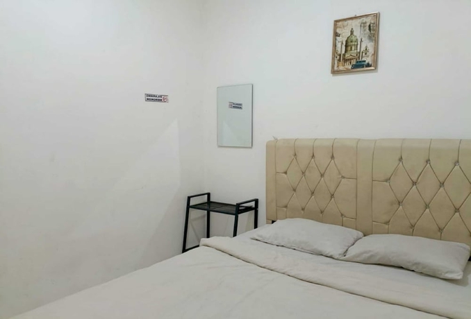 Imagen de la habitación del Hotel OYO 93720 3D Residence. Foto 9