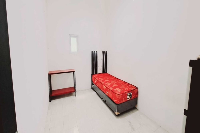 Imagen de la habitación del Hotel OYO 93722 Shannhay Guest House Syariah. Foto 3