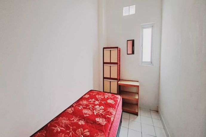 Imagen de la habitación del Hotel OYO 93722 Shannhay Guest House Syariah. Foto 4