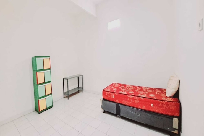 Imagen de la habitación del Hotel OYO 93722 Shannhay Guest House Syariah. Foto 5