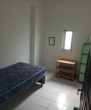 Imagen de la habitación del Hotel OYO 93722 Shannhay Guest House Syariah. Foto 7