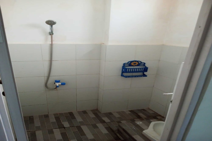 Imagen de la habitación del Hotel OYO 93722 Shannhay Guest House Syariah. Foto 8