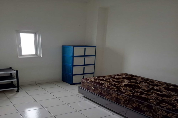 Imagen de la habitación del Hotel OYO 93722 Shannhay Guest House Syariah. Foto 9