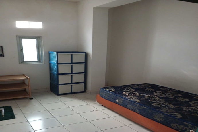 Imagen de la habitación del Hotel OYO 93722 Shannhay Guest House Syariah. Foto 10