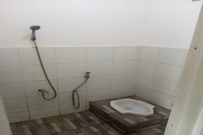 Imagen de la habitación del Hotel OYO 93722 Shannhay Guest House Syariah. Foto 13