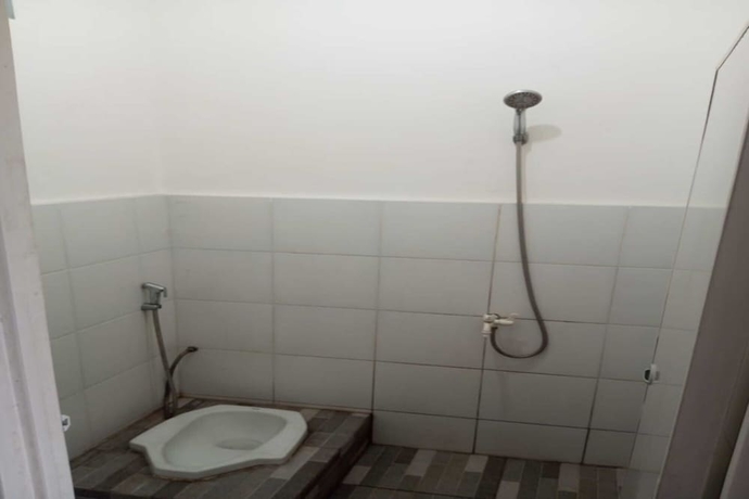 Imagen de la habitación del Hotel OYO 93722 Shannhay Guest House Syariah. Foto 14