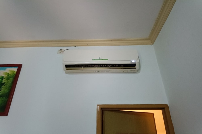 Imagen de la habitación del Hotel OYO 93723 Vj Sweethome Syariah. Foto 2