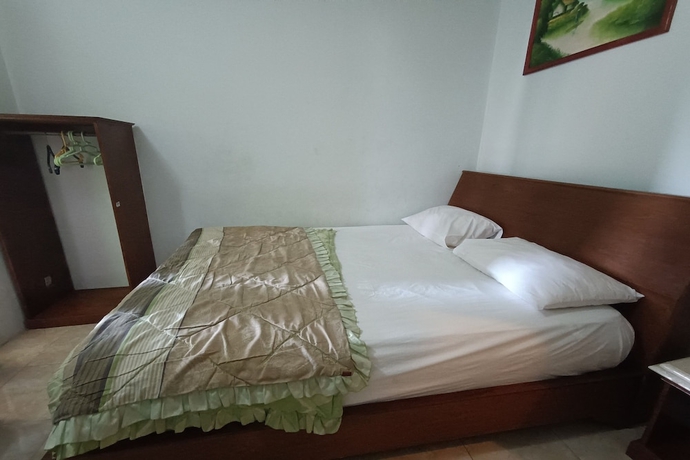 Imagen de la habitación del Hotel OYO 93723 Vj Sweethome Syariah. Foto 4