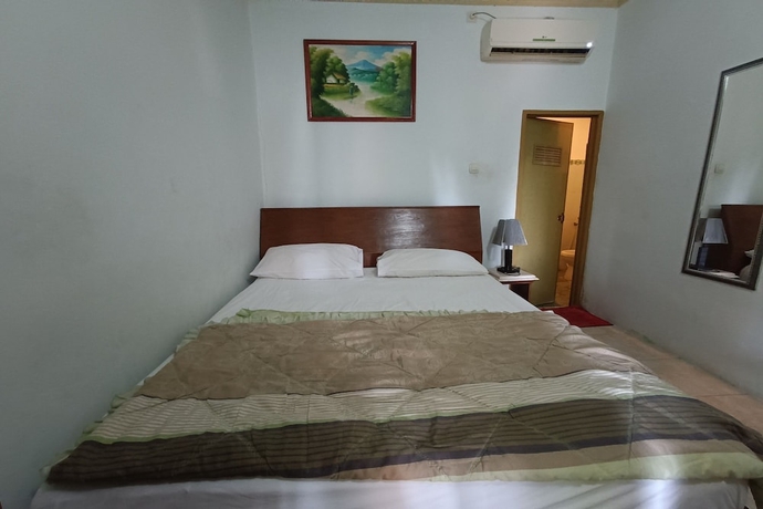 Imagen de la habitación del Hotel OYO 93723 Vj Sweethome Syariah. Foto 6