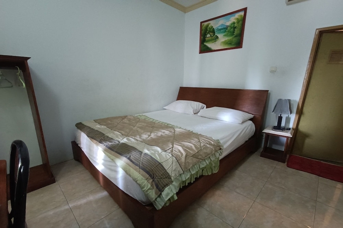 Imagen de la habitación del Hotel OYO 93723 Vj Sweethome Syariah. Foto 7