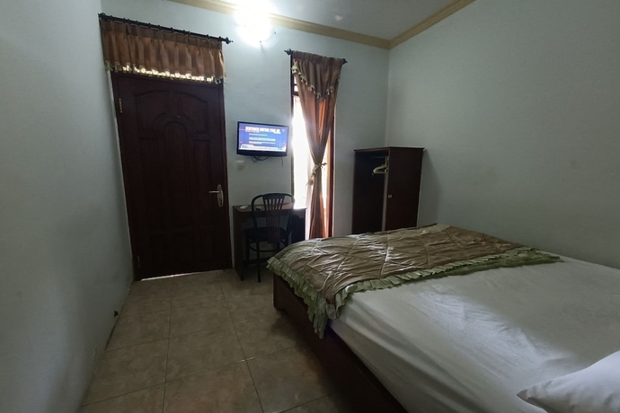 Imagen de la habitación del Hotel OYO 93723 Vj Sweethome Syariah. Foto 9