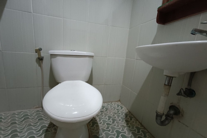 Imagen de la habitación del Hotel OYO 93723 Vj Sweethome Syariah. Foto 10