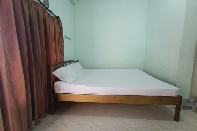 Imagen de la habitación del Hotel OYO 93729 Radesa Family Homestay. Foto 2