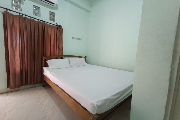 Imagen de la habitación del Hotel OYO 93729 Radesa Family Homestay. Foto 3