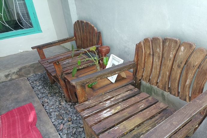 Imagen de los interiores del Hotel OYO 93729 Radesa Family Homestay. Foto 12