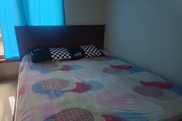 Imagen de la habitación del Hotel OYO 93729 Radesa Family Homestay. Foto 8