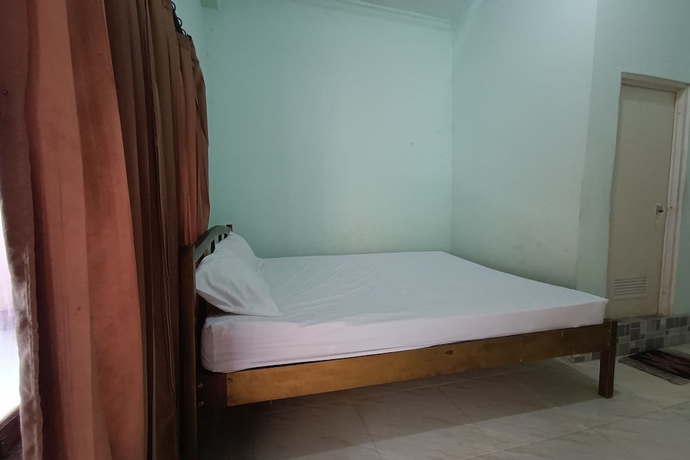 Imagen de la habitación del Hotel OYO 93729 Radesa Family Homestay. Foto 9
