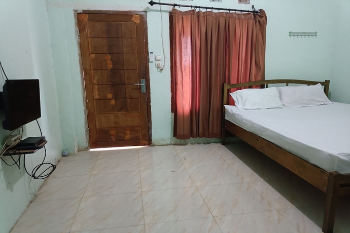 Imagen de la habitación del Hotel OYO 93729 Radesa Family Homestay. Foto 10