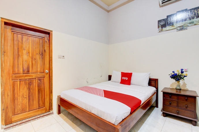 Imagen de la habitación del Hotel OYO 93736 Homestay Joglo Dephis Syariah. Foto 11