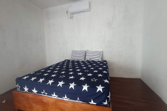 Imagen de la habitación del Hotel OYO 93737 Bale Oyan Homestay. Foto 2