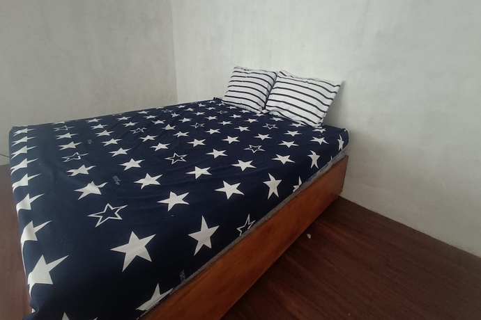 Imagen de la habitación del Hotel OYO 93737 Bale Oyan Homestay. Foto 4