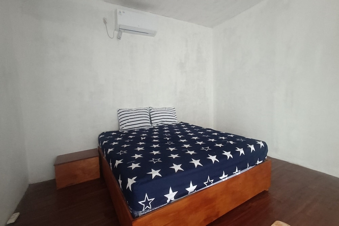 Imagen de la habitación del Hotel OYO 93737 Bale Oyan Homestay. Foto 7