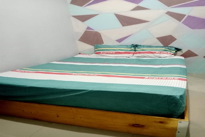 Imagen de la habitación del Hotel OYO 93737 Bale Oyan Homestay. Foto 11
