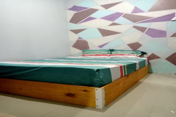 Imagen de la habitación del Hotel OYO 93737 Bale Oyan Homestay. Foto 12