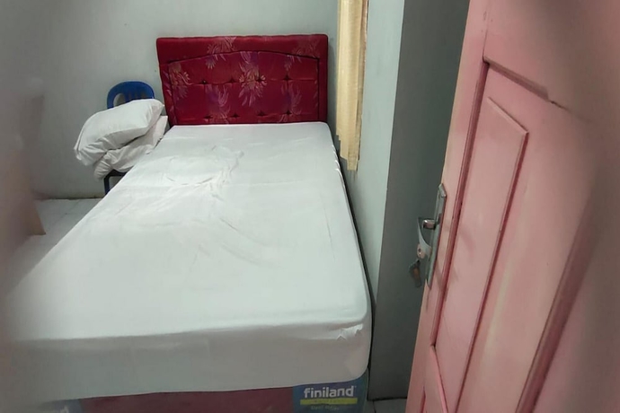 Imagen de la habitación del Hotel OYO 93745 Penginapan Naya Rita. Foto 3