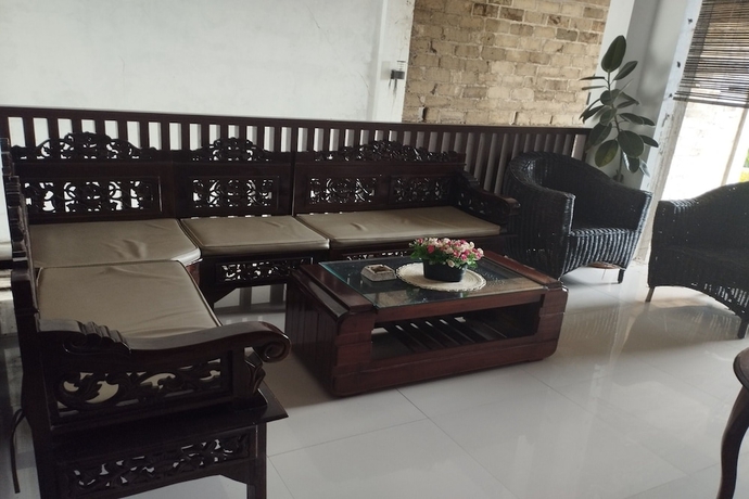 Imagen de los interiores del Hotel OYO 93745 Penginapan Naya Rita. Foto 17