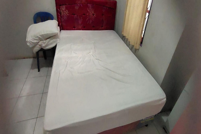 Imagen de la habitación del Hotel OYO 93745 Penginapan Naya Rita. Foto 5