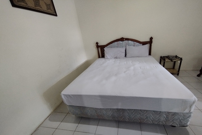 Imagen de la habitación del Hotel OYO 93745 Penginapan Naya Rita. Foto 6