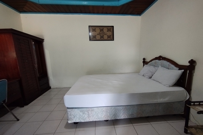 Imagen de la habitación del Hotel OYO 93745 Penginapan Naya Rita. Foto 11
