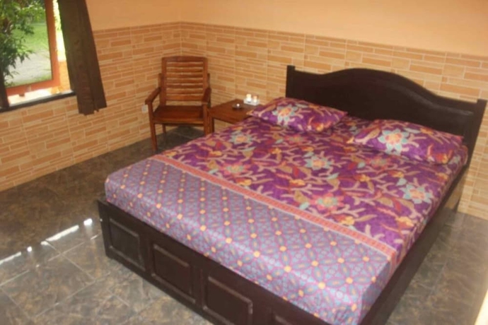 Imagen de la habitación del Hotel OYO 93747 Balekui Homestay. Foto 2