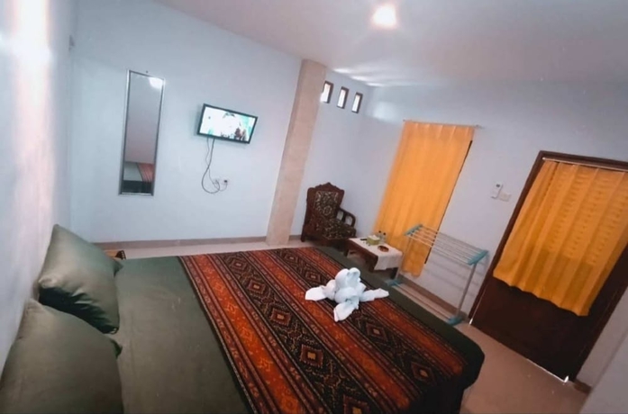 Imagen de la habitación del Hotel OYO 93747 Balekui Homestay. Foto 3