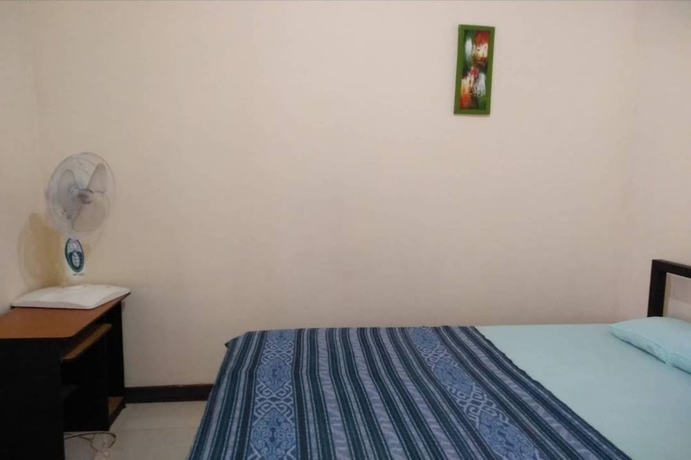 Imagen de la habitación del Hotel OYO 93747 Balekui Homestay. Foto 4