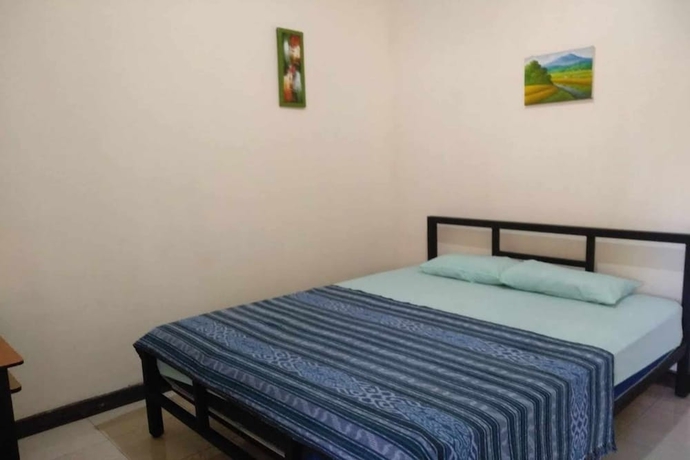 Imagen de la habitación del Hotel OYO 93747 Balekui Homestay. Foto 5