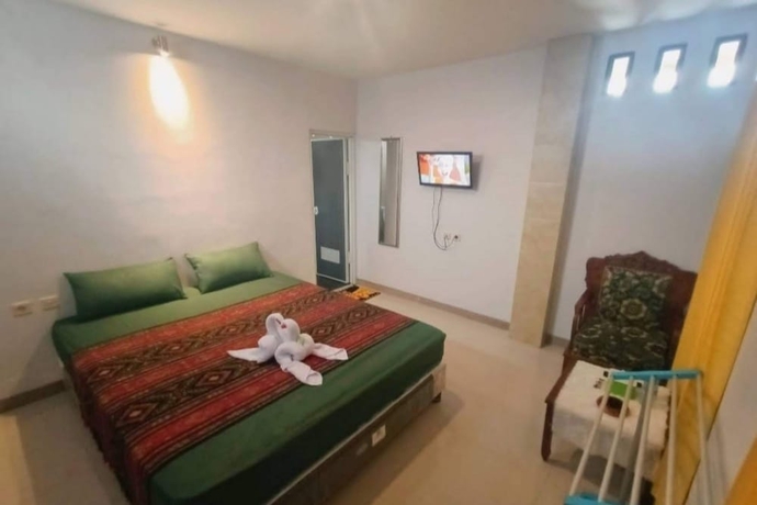 Imagen de la habitación del Hotel OYO 93747 Balekui Homestay. Foto 6