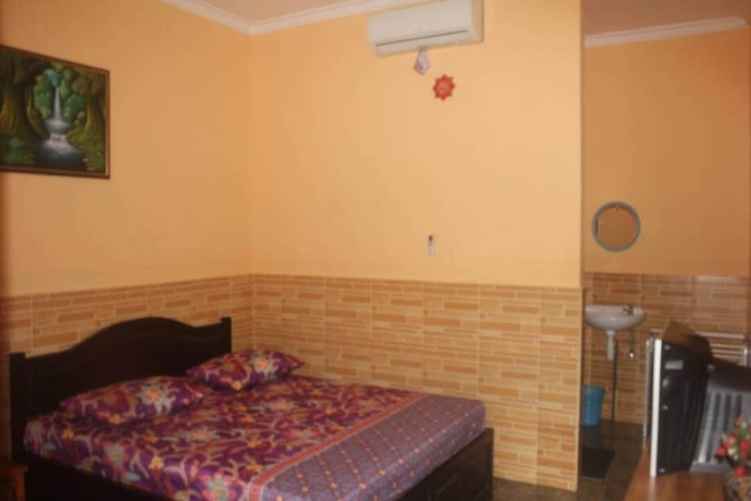 Imagen de la habitación del Hotel OYO 93747 Balekui Homestay. Foto 7