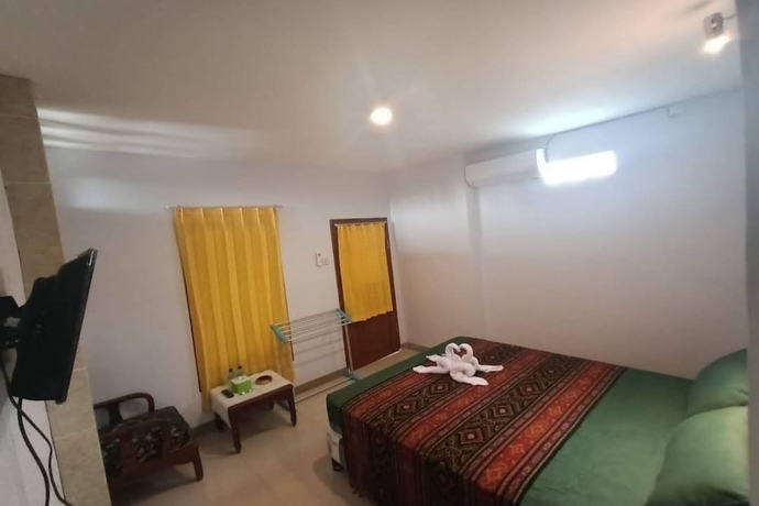 Imagen de la habitación del Hotel OYO 93747 Balekui Homestay. Foto 8
