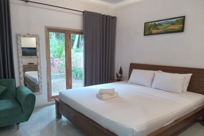 Imagen de la habitación del Hotel OYO 93748 Tungku Klui. Foto 3