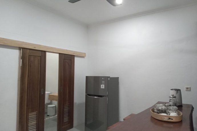Imagen de la habitación del Hotel OYO 93748 Tungku Klui. Foto 4