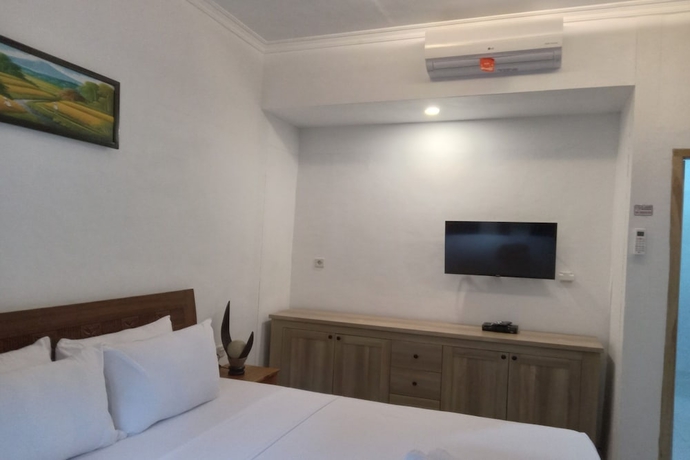 Imagen de la habitación del Hotel OYO 93748 Tungku Klui. Foto 5