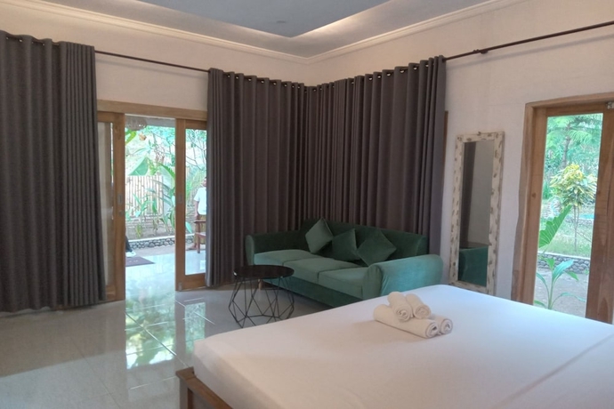 Imagen de la habitación del Hotel OYO 93748 Tungku Klui. Foto 6
