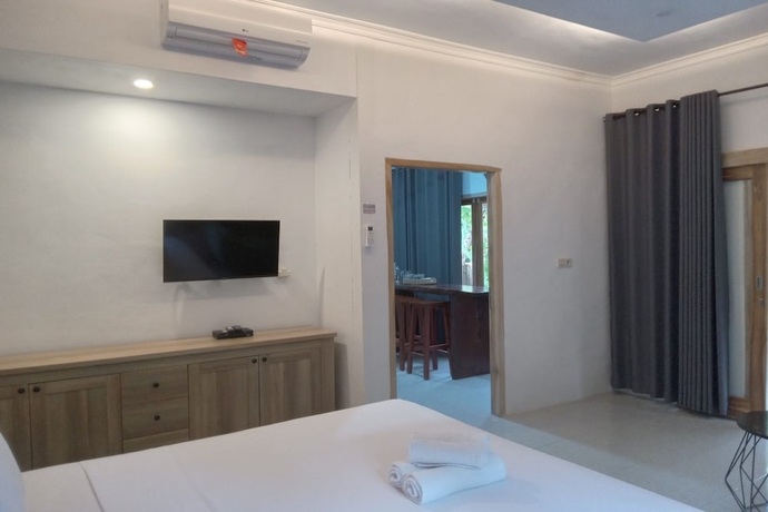 Imagen de la habitación del Hotel OYO 93748 Tungku Klui. Foto 8
