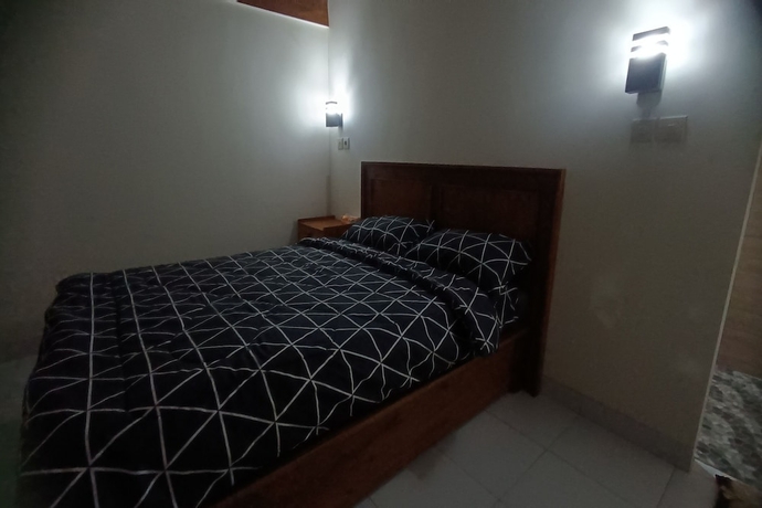 Imagen de la habitación del Hotel OYO 93766 Bunga Homestay. Foto 3