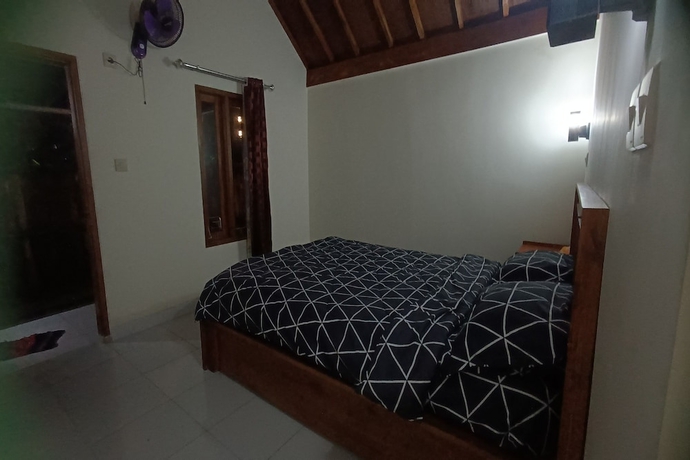 Imagen de la habitación del Hotel OYO 93766 Bunga Homestay. Foto 4